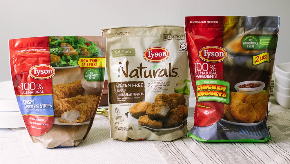 Three bags of Tyson chicken products.