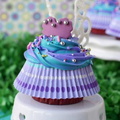 Finished fairy cupcake with wings and skirt on a cake stand