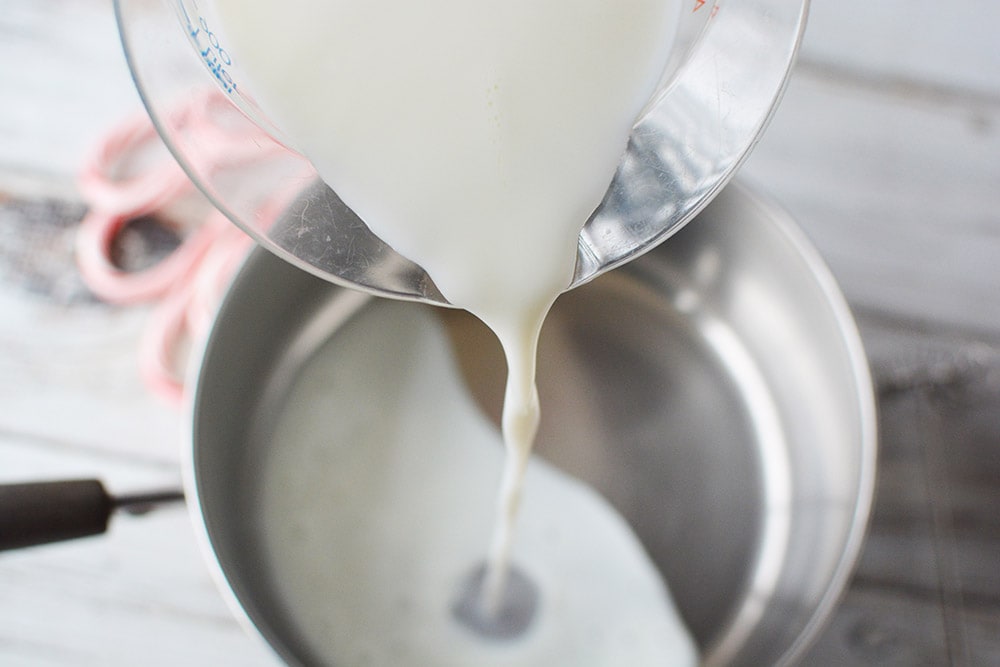 Pour milk into saucepan.