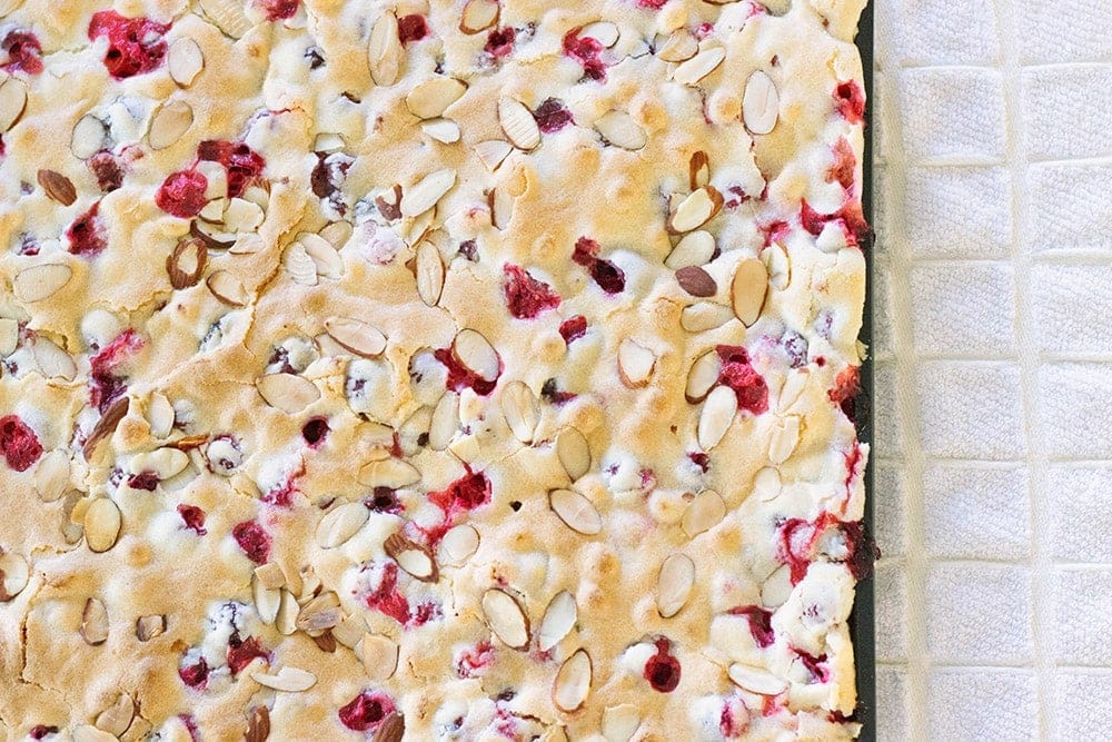 Cranberry almond cake in a sheet pan.
