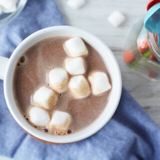Overhead shot of hot cocoa with marshmallows in a mug