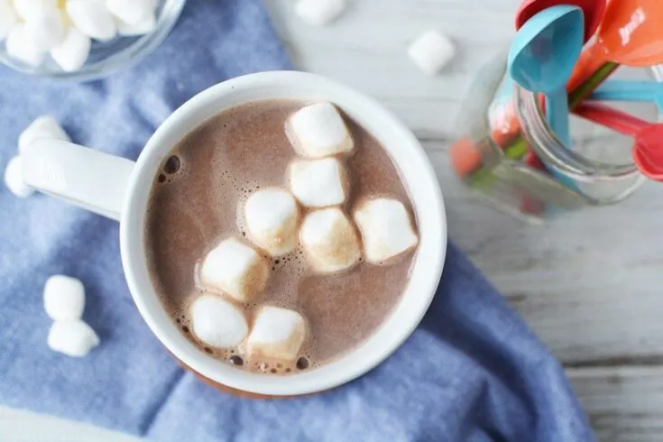 Overhead shot of hot cocoa with marshmallows in a mug