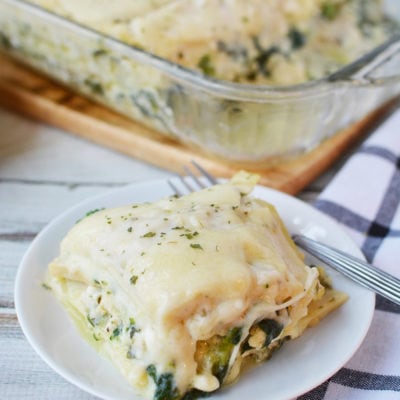 Chicken lasagna with spinach topped with cheese