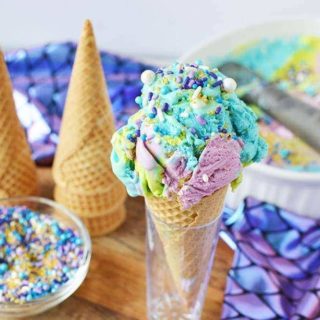 Mermaid ice cream in a cone with sprinkles