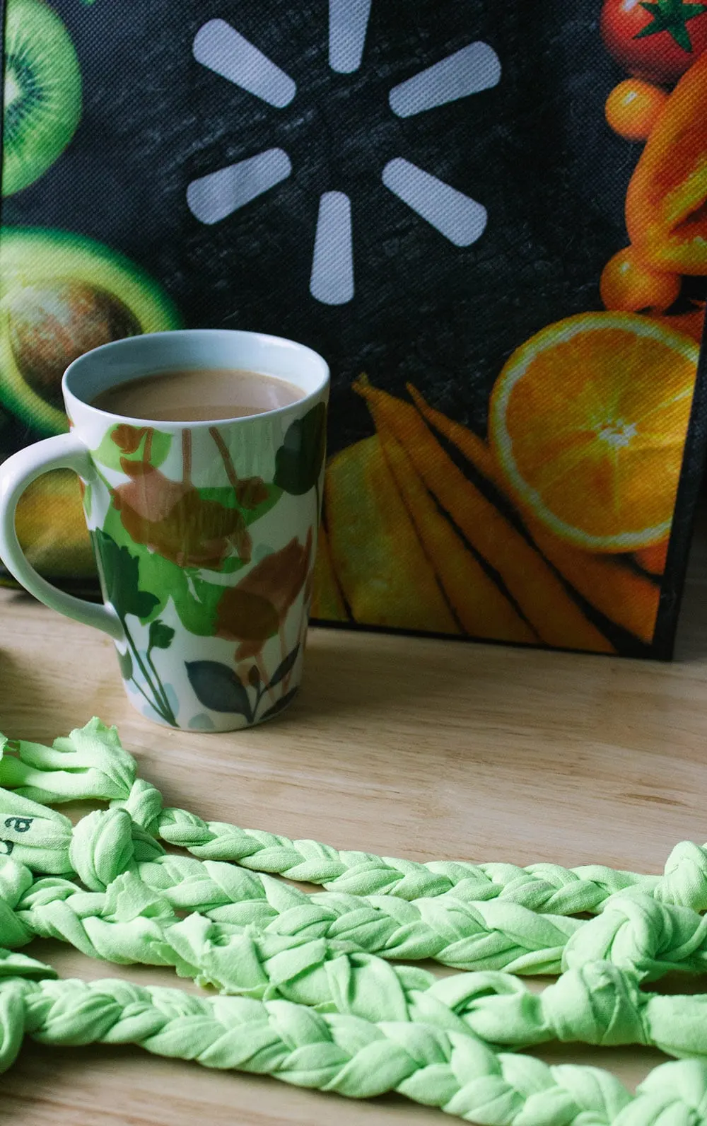 Coffee and DIY Dog toys next to a reusable Walmart tote bag. 