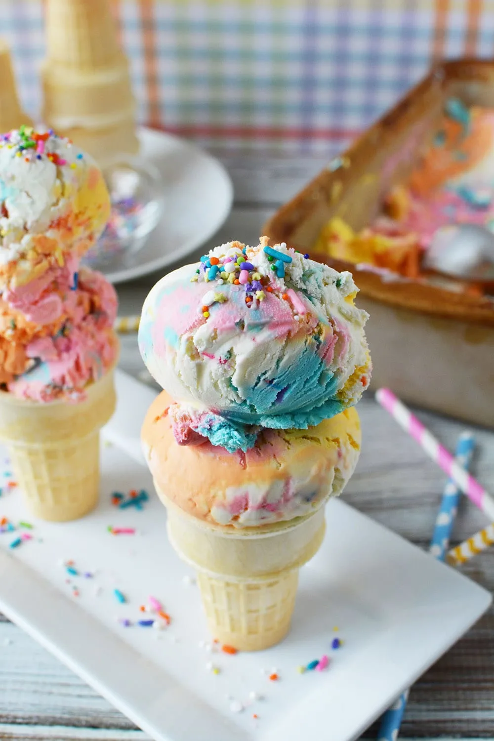 Colorful ice cream cone with sprinkles.