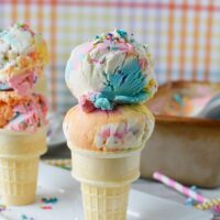 Ice cream cone with two scoops of unicorn ice cream