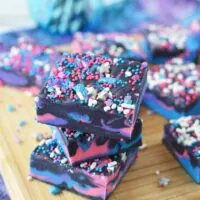 Stacked galaxy fudge with slices on a board