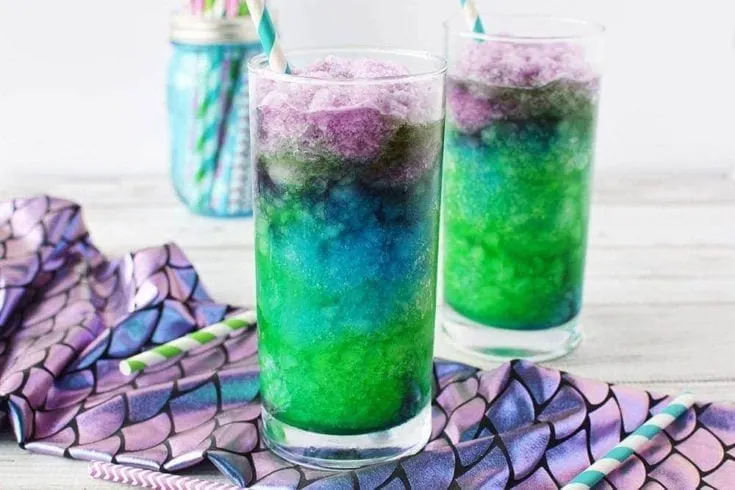 Mermaid drinks in glasses with straws