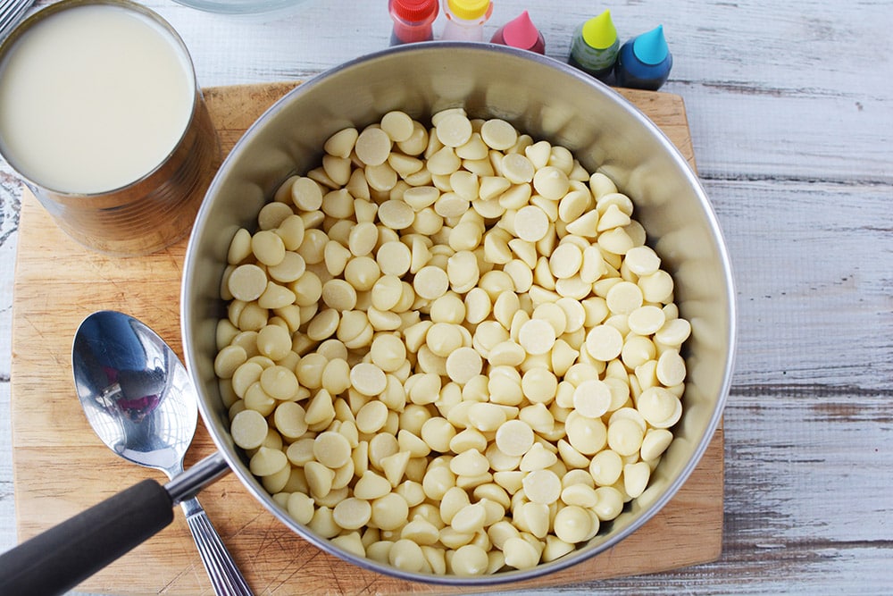 White chocolate chips in a saucepan.