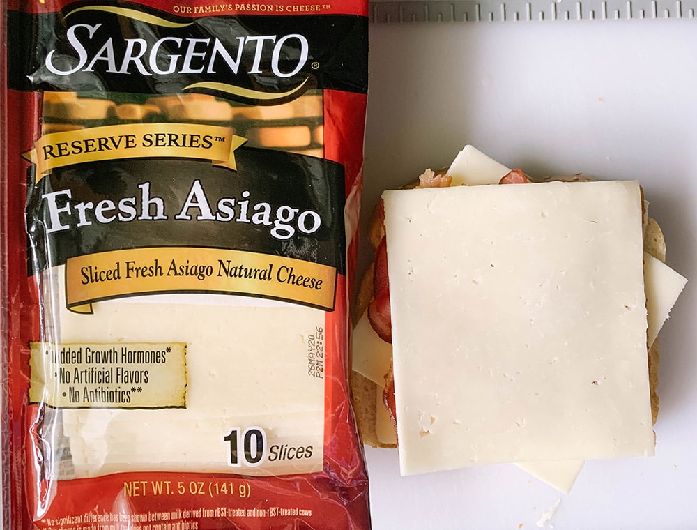 Asiago cheese on bread and in package
