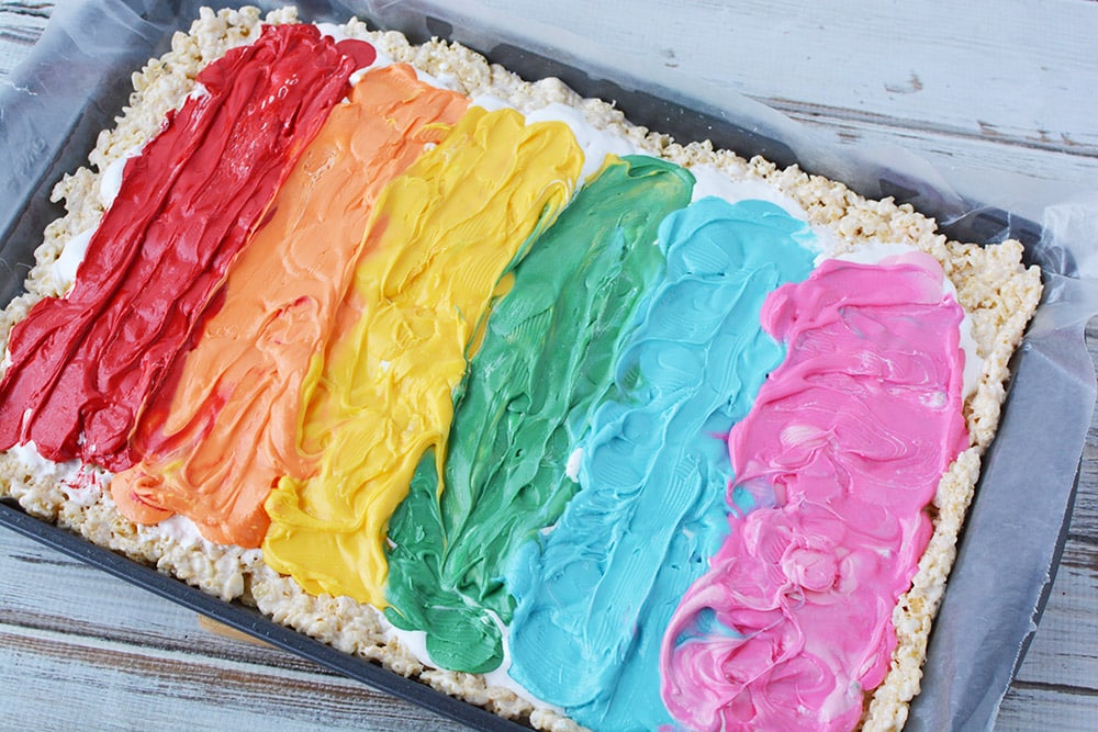Melted candy melts on rice crispy cereal.