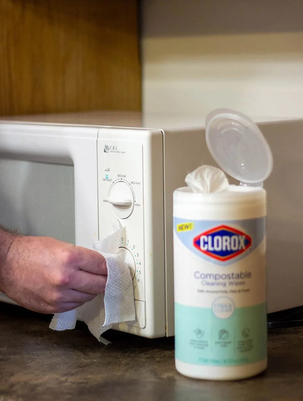 Clorox wipes by the microwave.