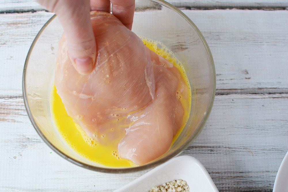 dip chicken into egg mixture