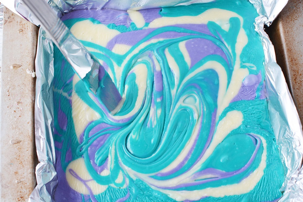 Swirling fudge with knife.