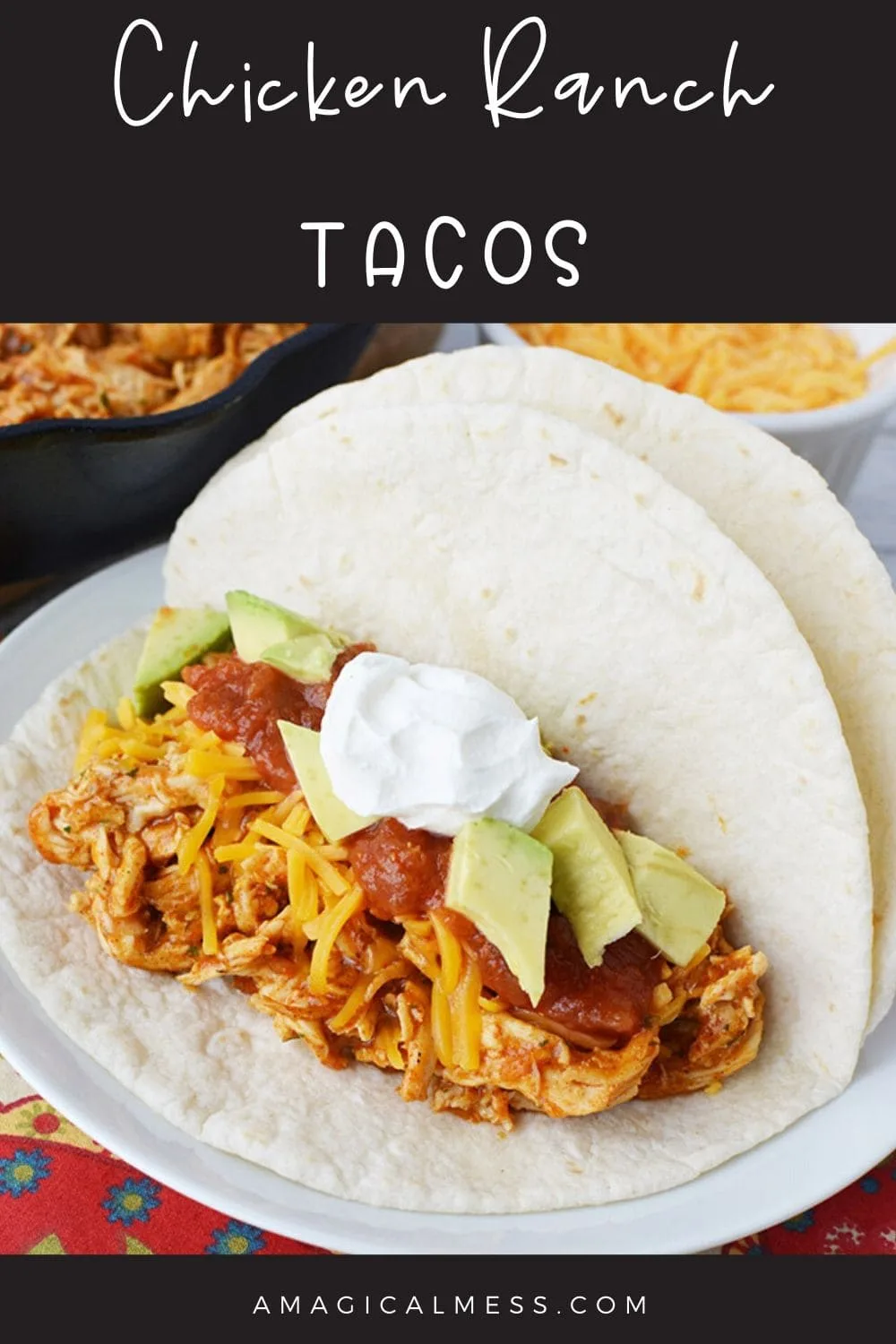 Shredded chicken taco with toppings on a plate