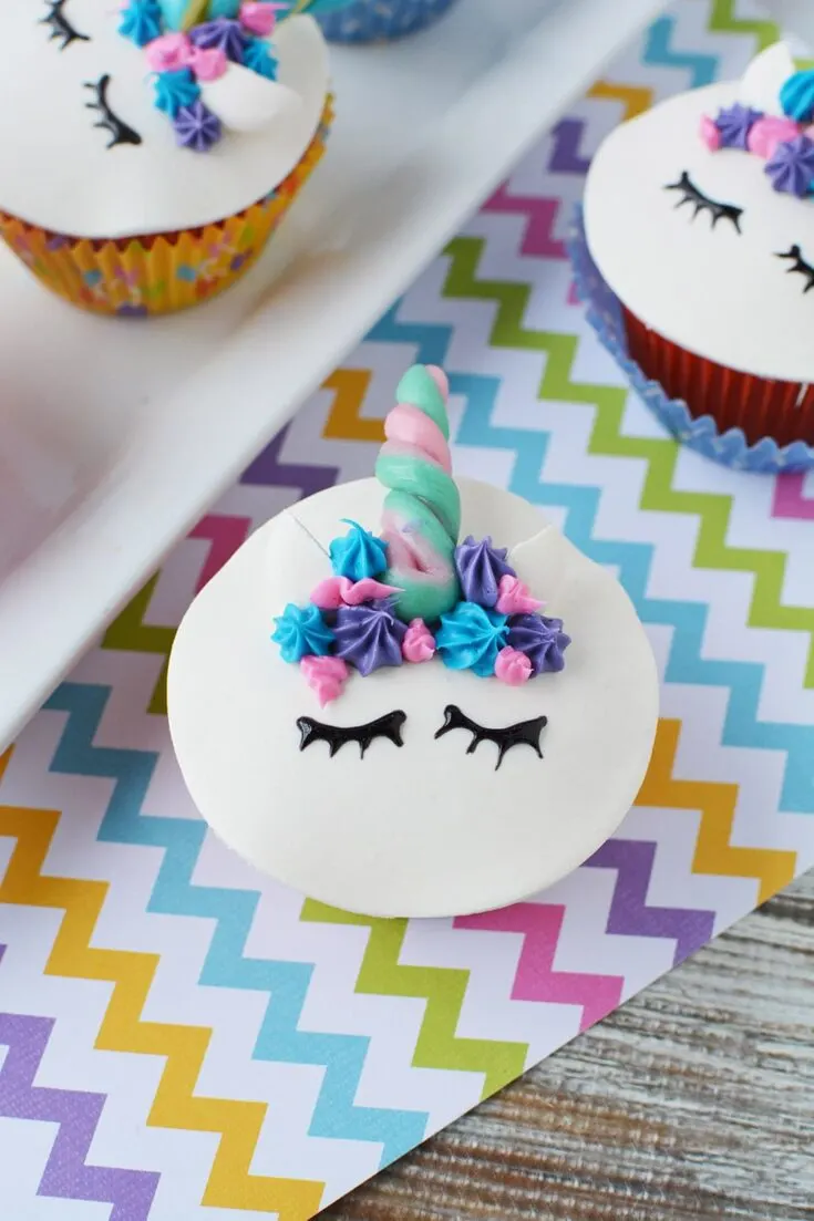 unicorn cupcakes with eyes and horn