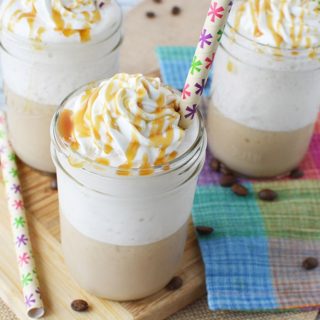 Caramel frappuccinos in glasses with straws