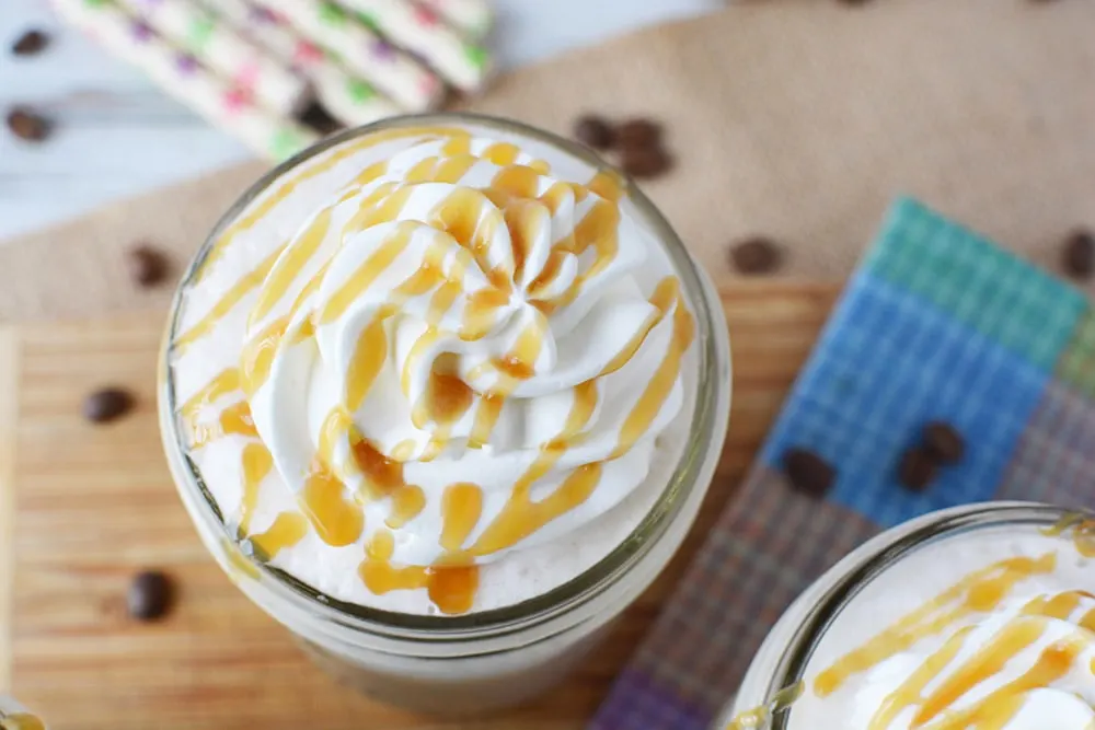 Caramel topping on whipped cream.
