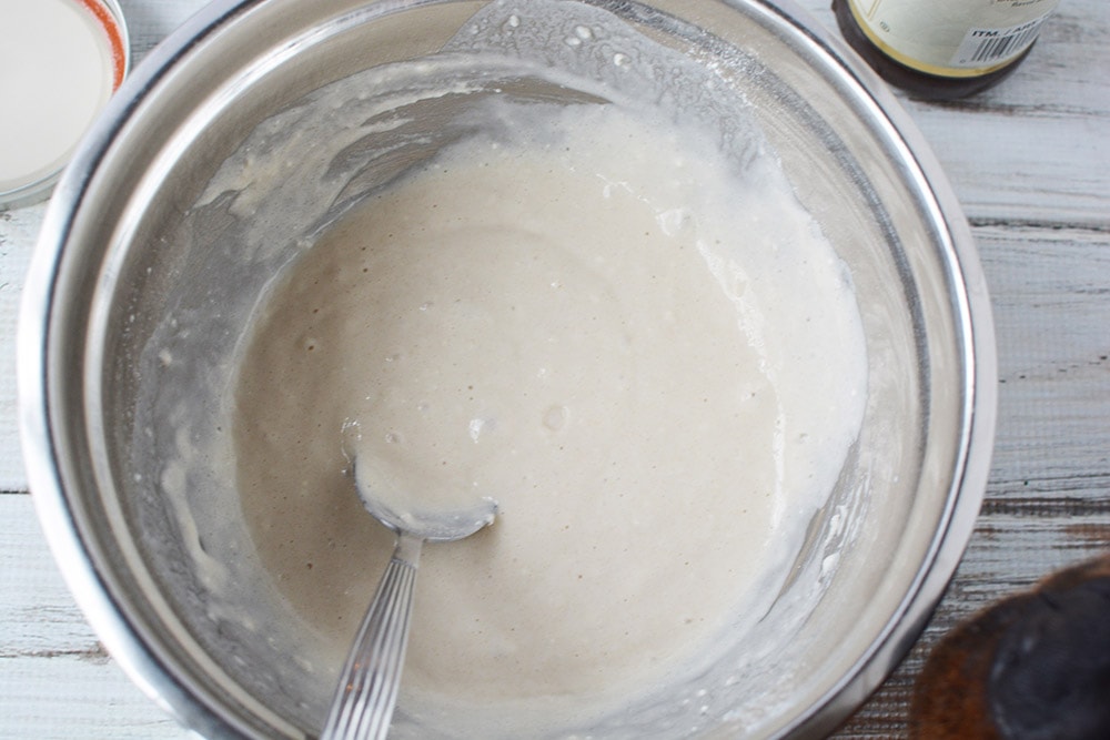 Mixing pancake mix in bowl.