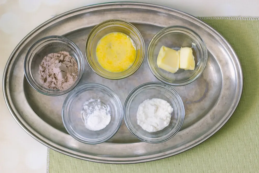 Keto mug cake ingredients on a tray. 