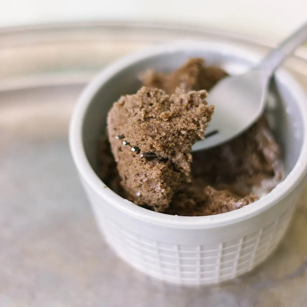 Chocolate keto mug cake with a fork.