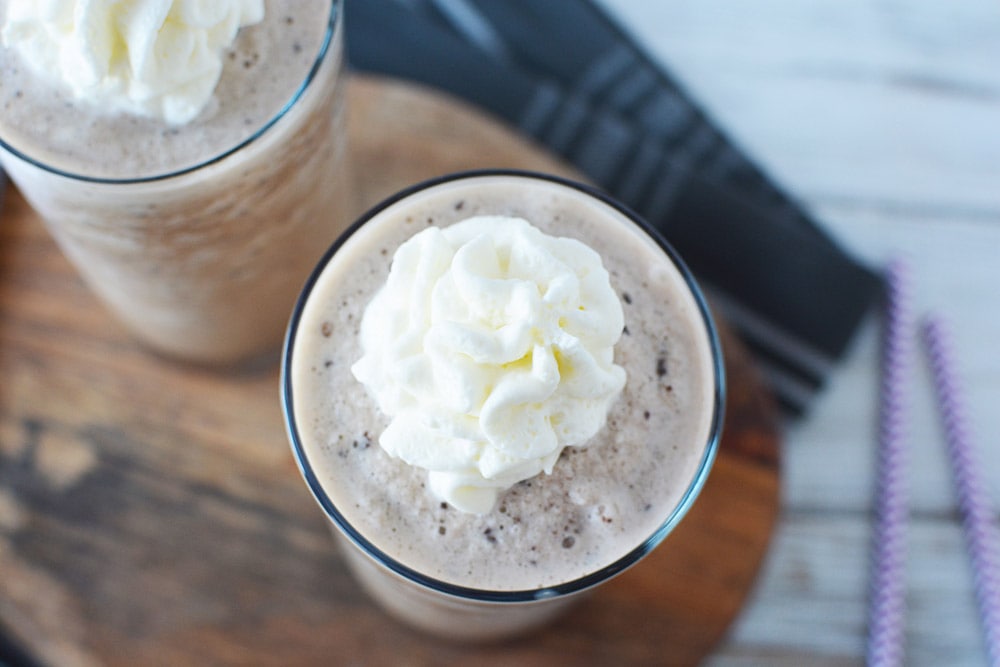 Whipped cream on top of blended frappuccino.