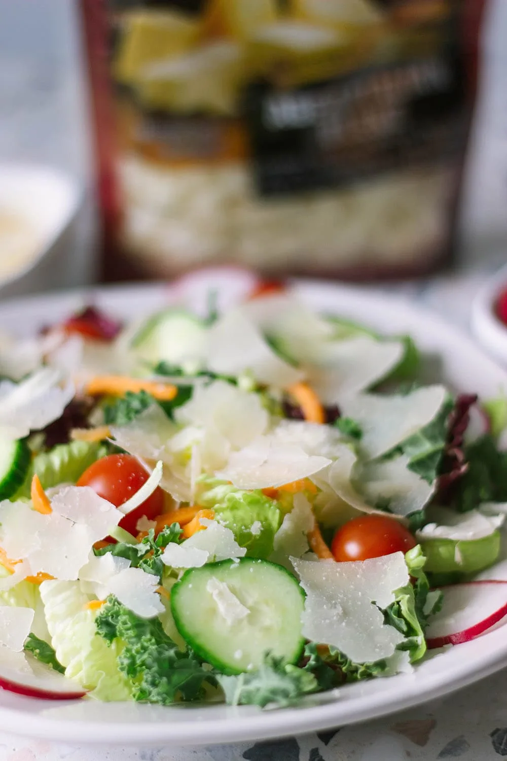 Salad with shaved parmesan.