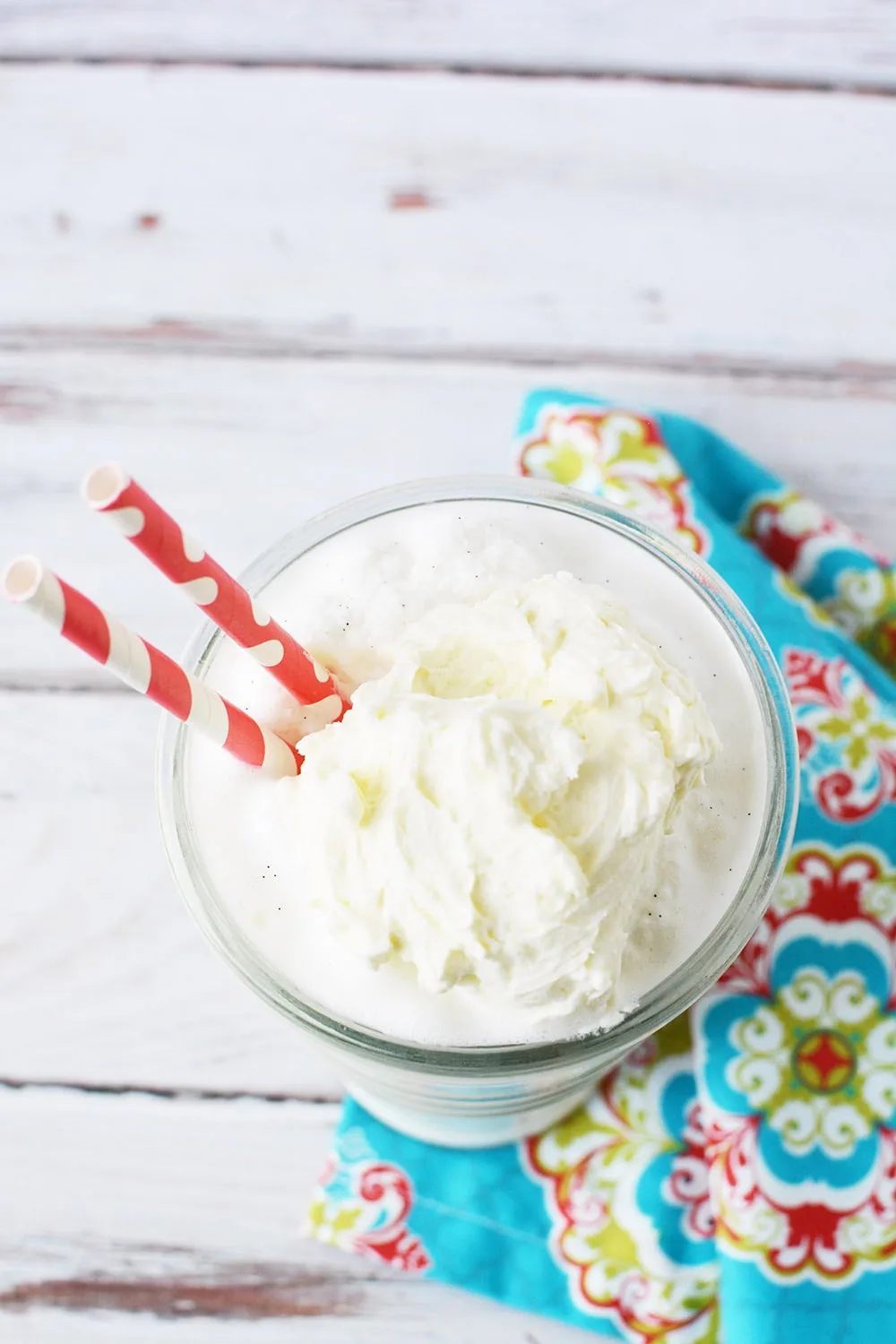 overhead shot of a vanilla shake with whipped cream
