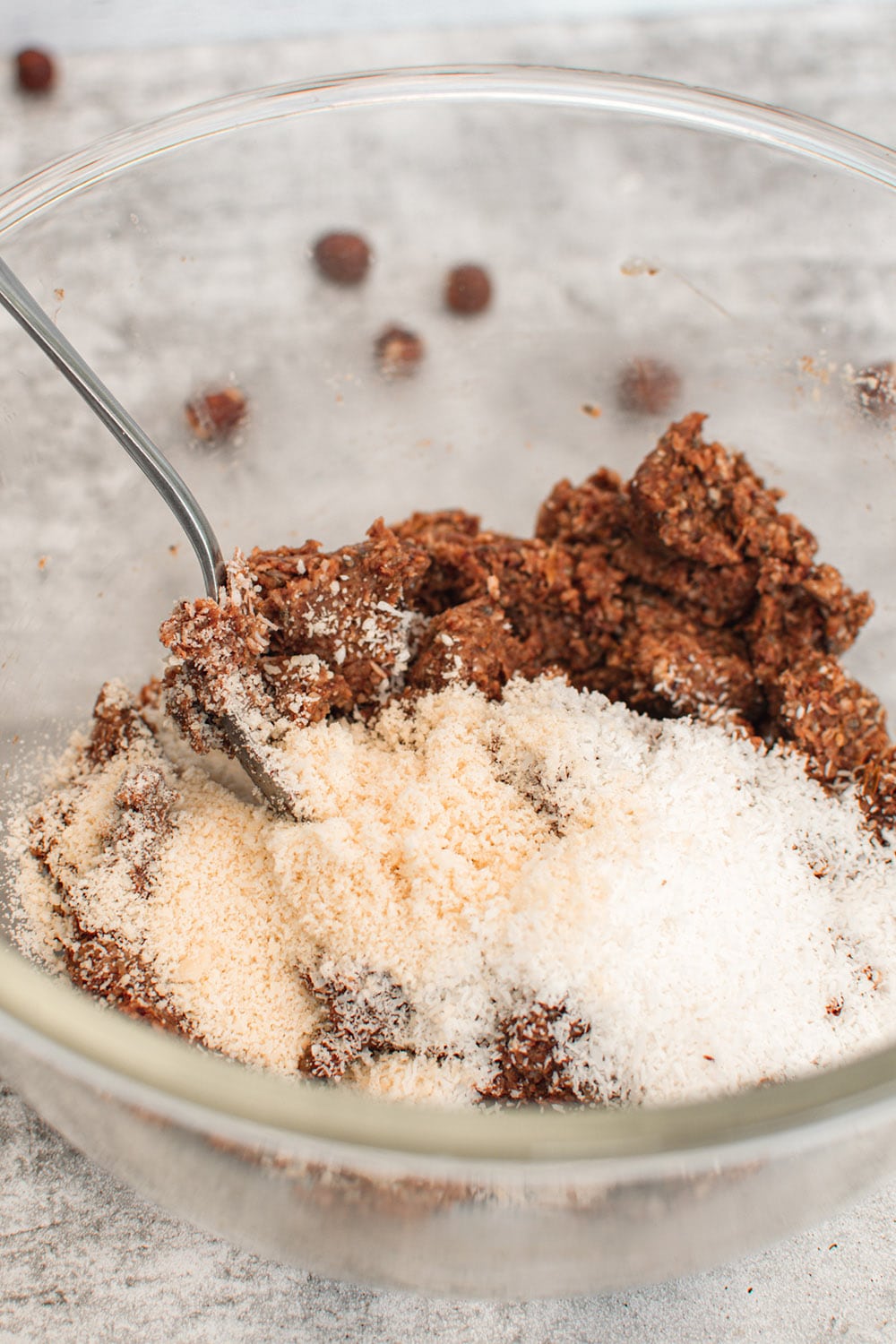Dry ingredients into wet for energy date bites.