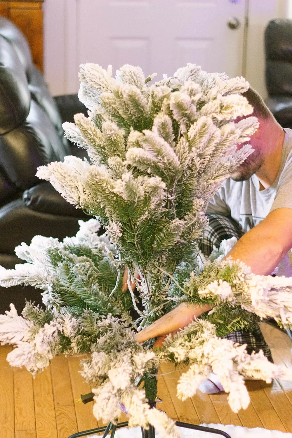 Top of artificial snow covered tree.