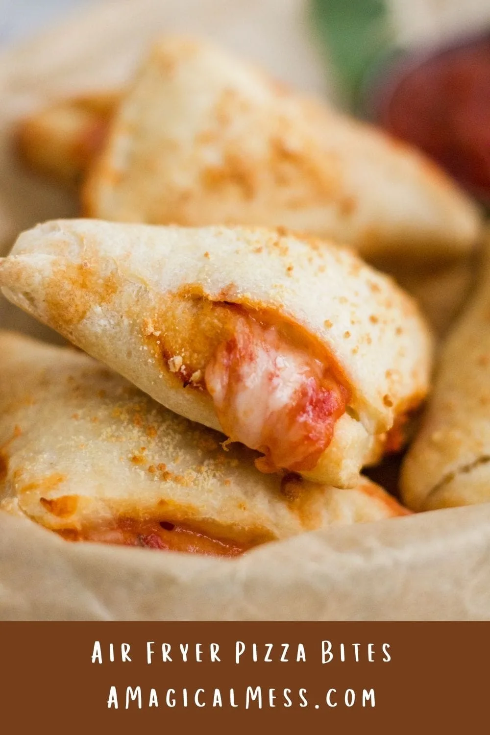 pizza pockets in a basket with cheese oozing out