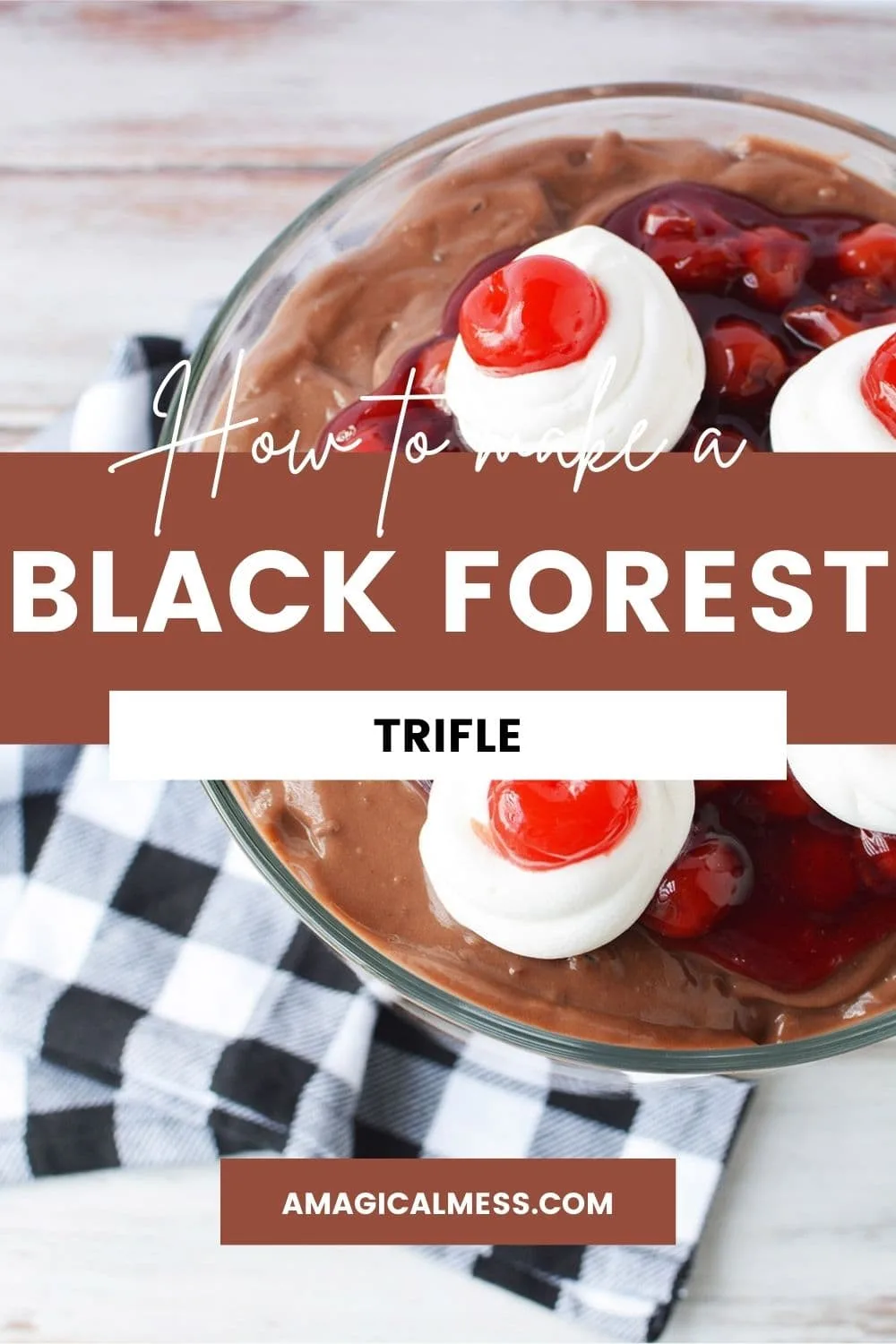 Top of a black forest trifle topped with cherries.