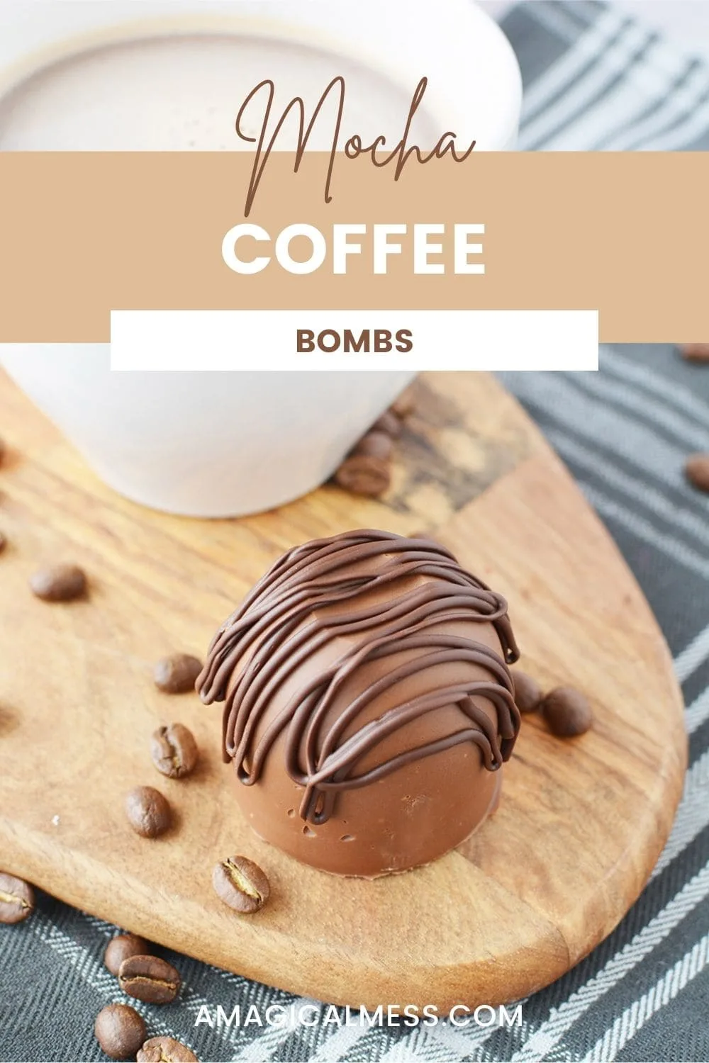 A coffee bomb sitting by coffee beans and a white mug.