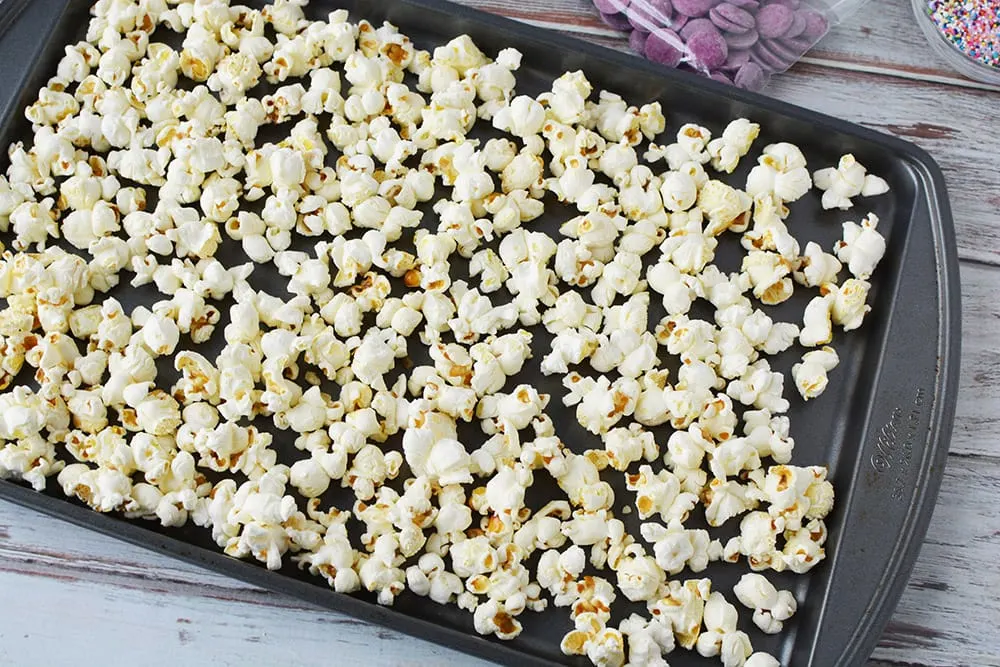 Popcorn on a baking sheet.