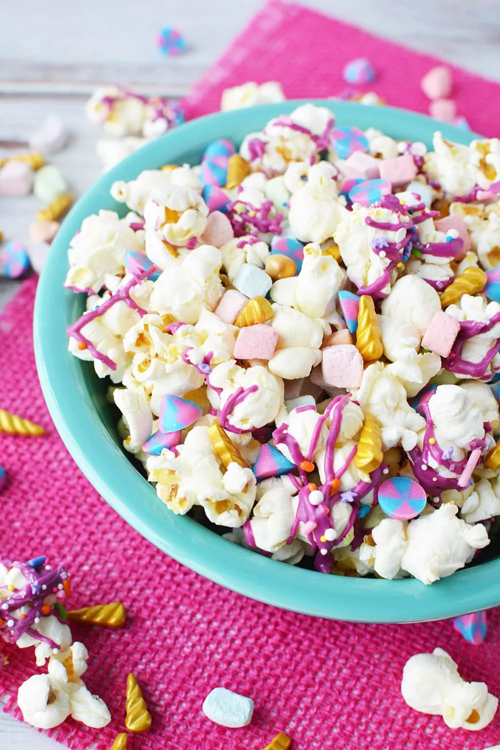 Colorful popcorn in a blue bowl. 