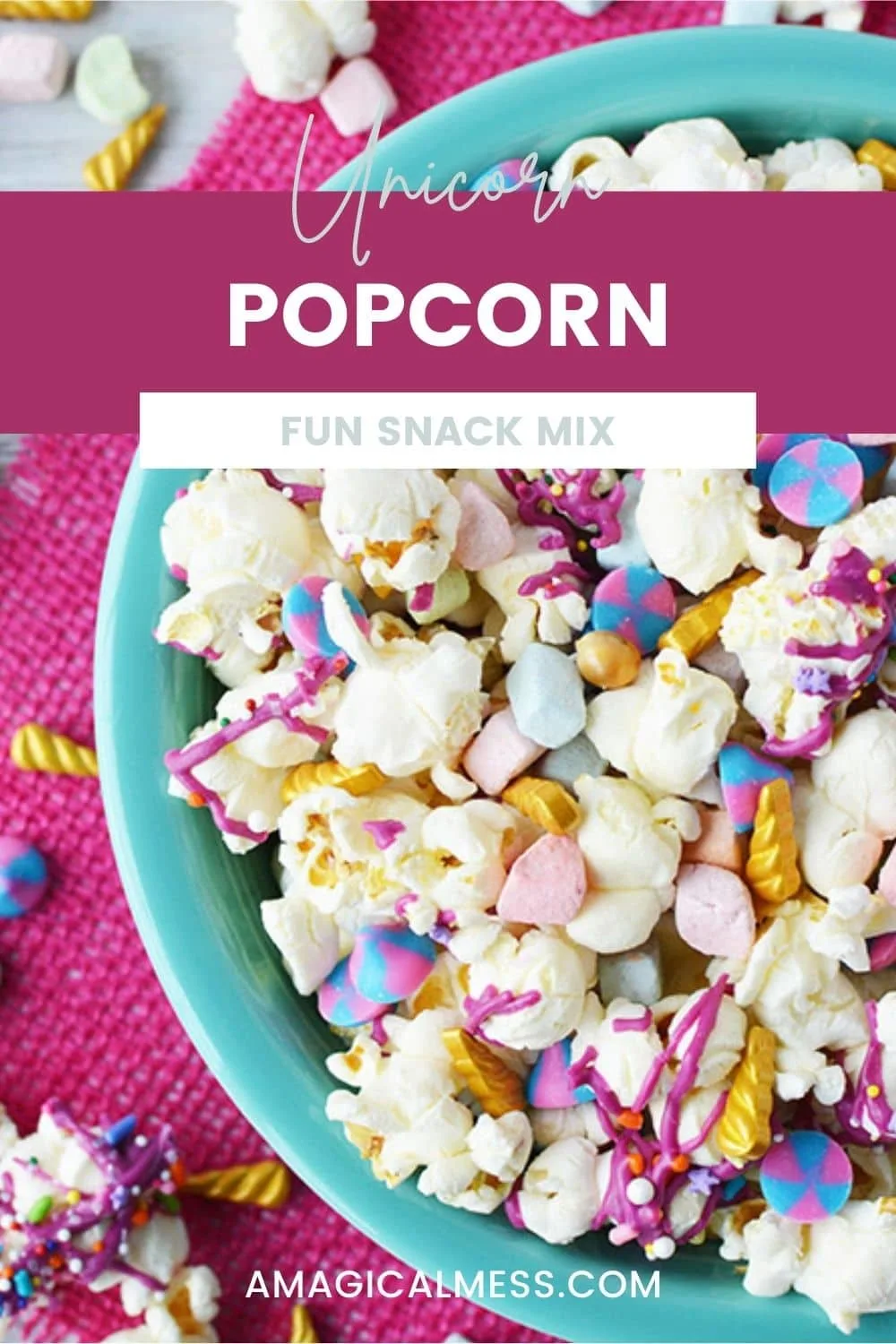 Blue bowl full of unicorn popcorn with candies.