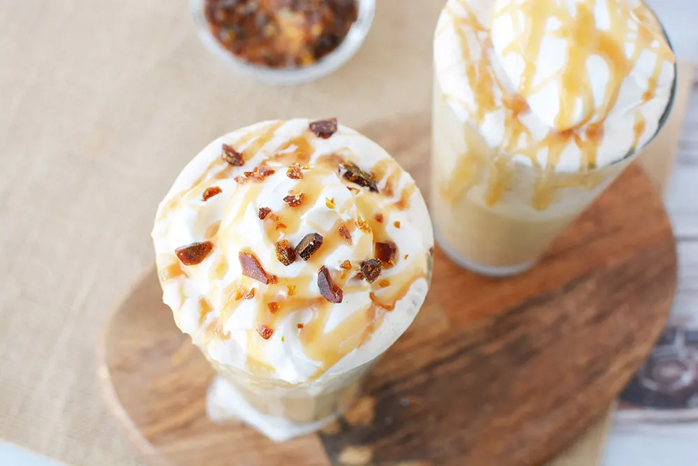 Top of caramel crunch drinks with crunch and whipped topping.