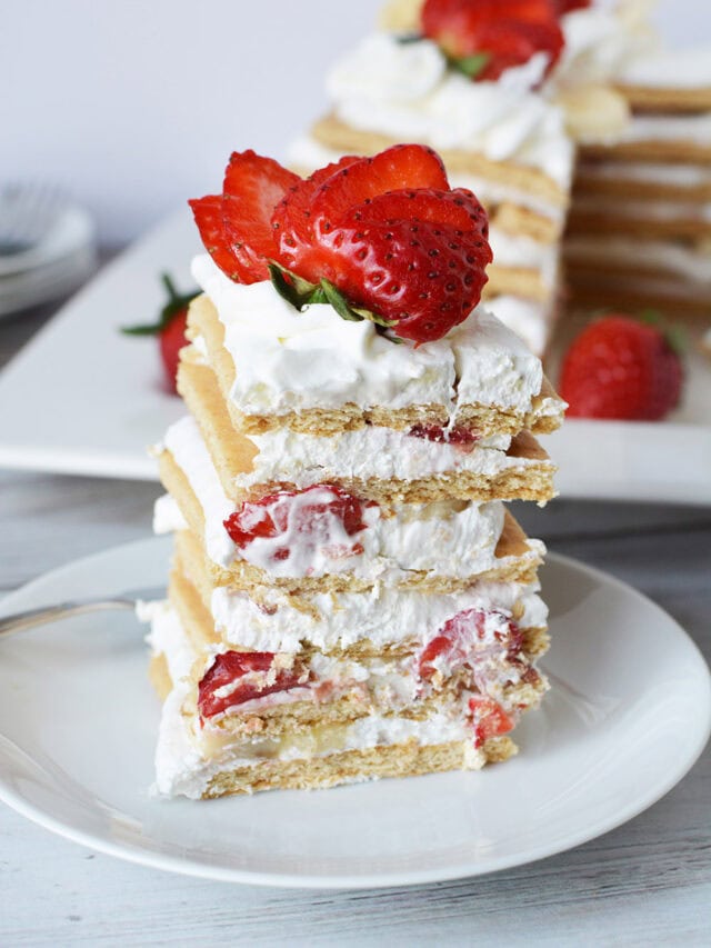 Banana split ice box cake on a plate.