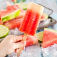 Holding a watermelon popsicle