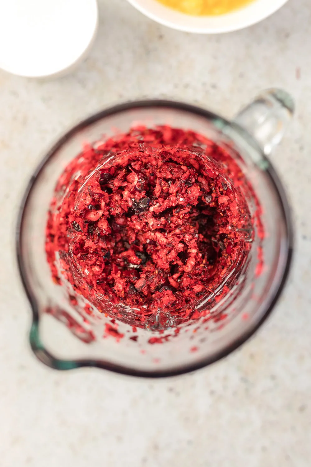 Cranberries in a food processor. 