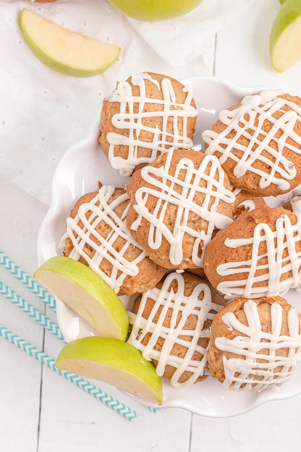 Glazed apple pie cookies on a plate.