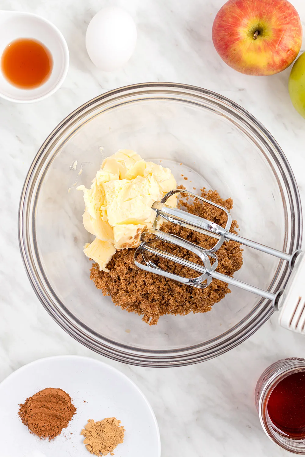 Butter and brown sugar in a mixing bowl.