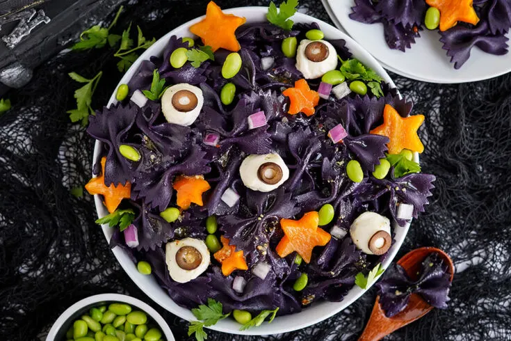 Overhead image of a Halloween pasta salad in a bowl.