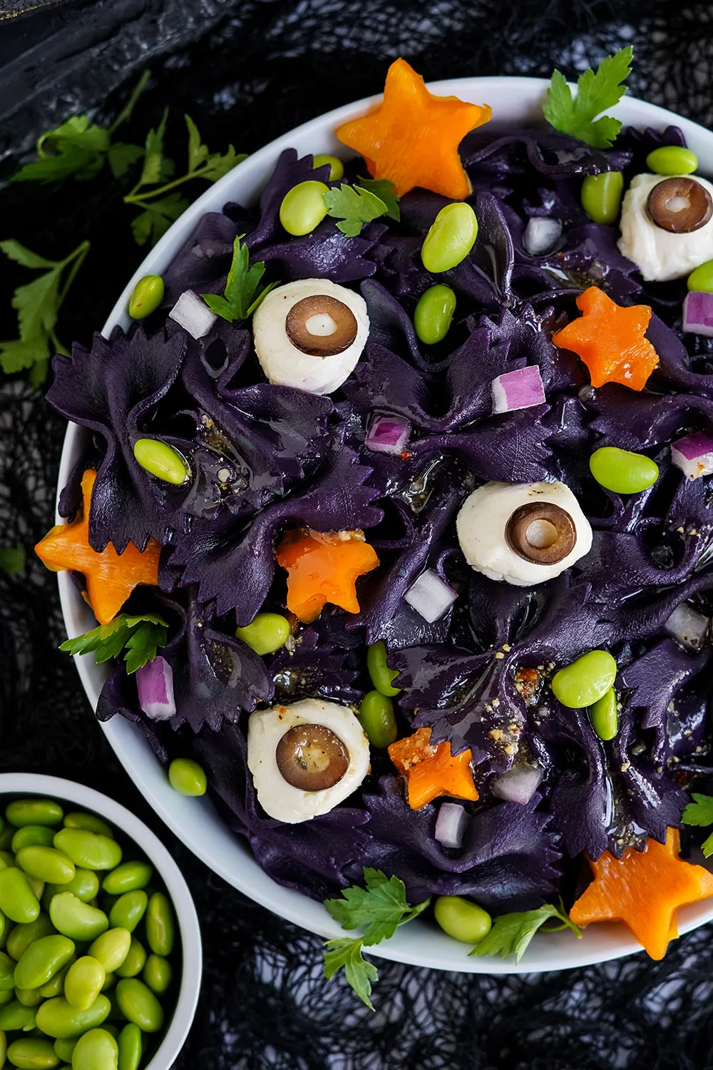Closeup of bowl full of bat pasta salad for Halloween.