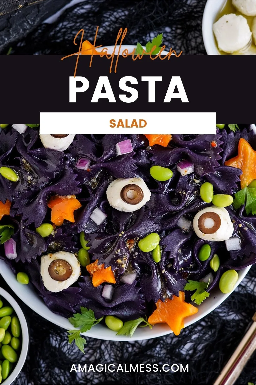 Orange, green, and purple veggies with dark pasta for a Halloween pasta salad.