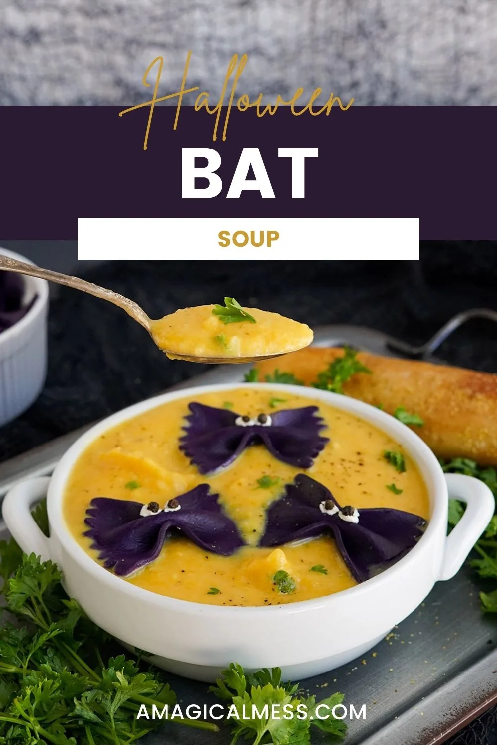Bowl of butternut squash bat soup with a spoon raised above it.