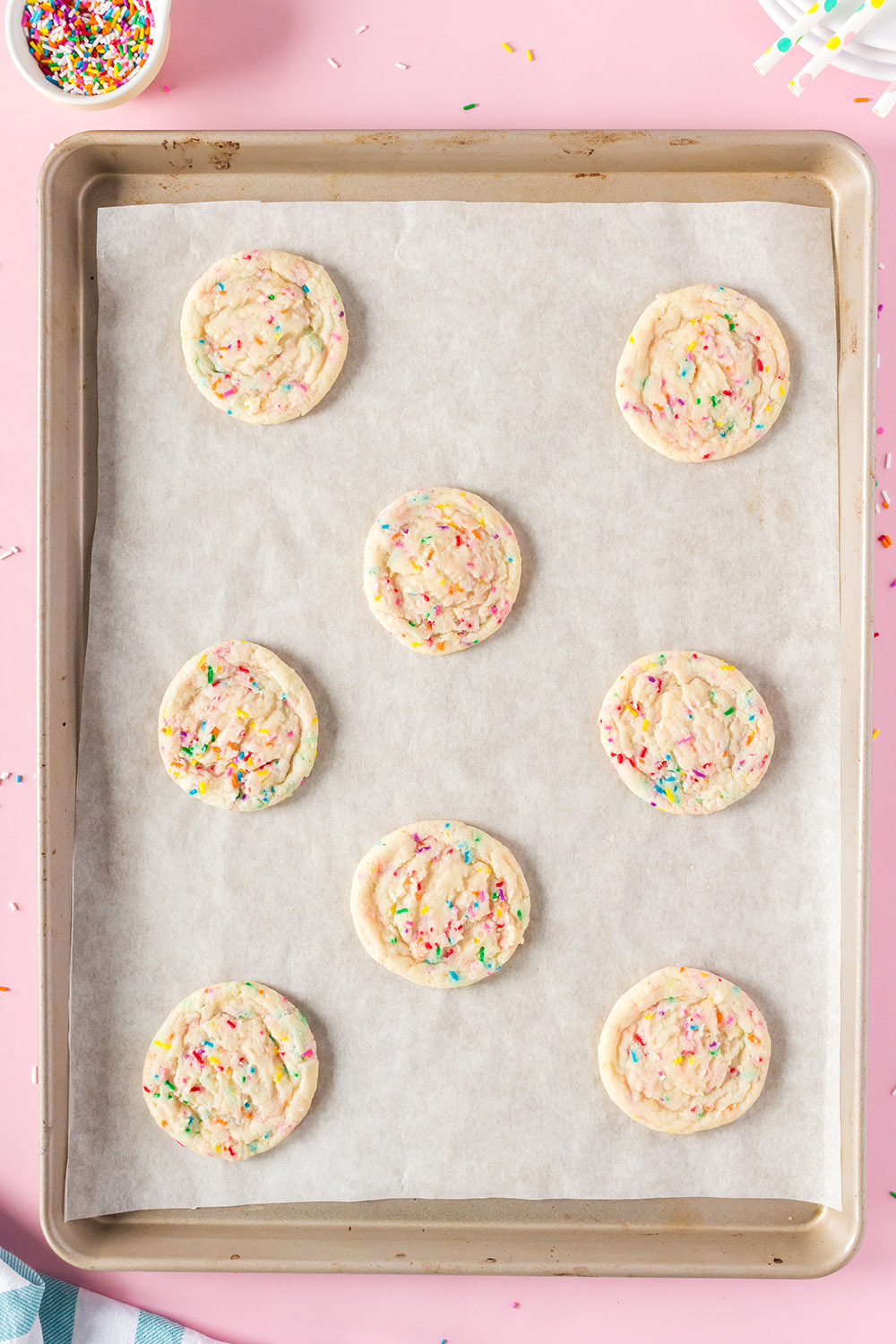 Baked confetti cookies on a baking sheet. 