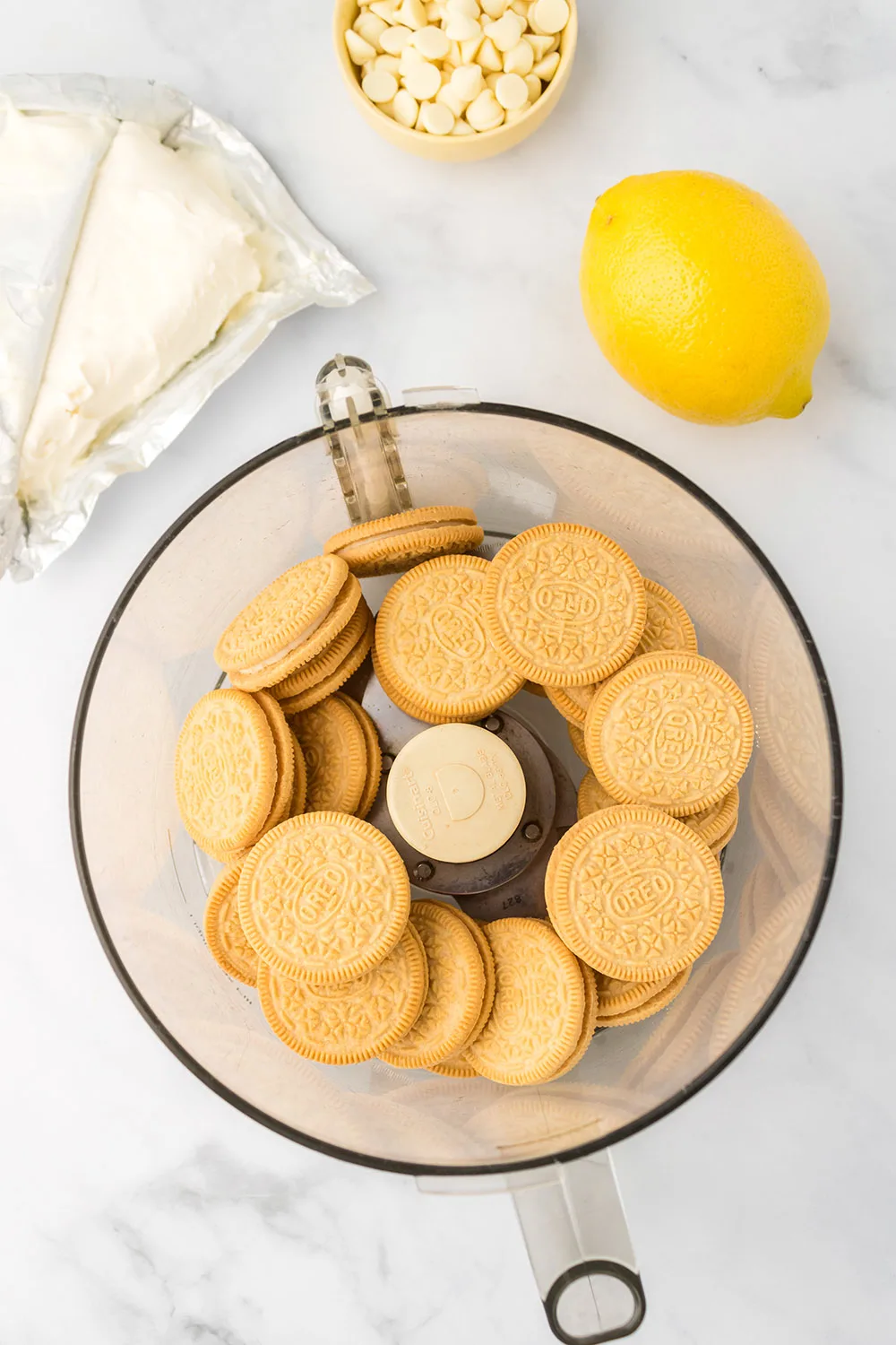 Lemon oreos in a food processor.