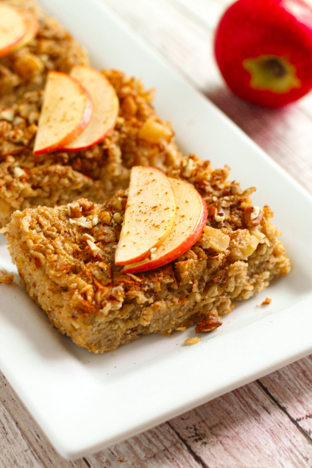 Sliced of apple spice baked oatmeal on a dish. 